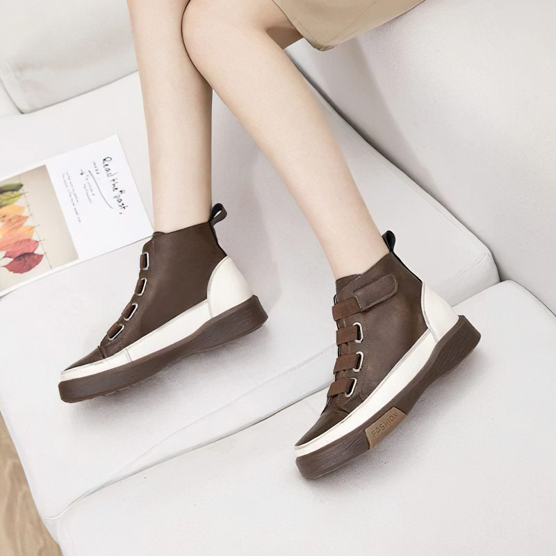 Stylish women's genuine leather sneakers in brown and white, featuring trendy round toe design and comfortable velcro straps.