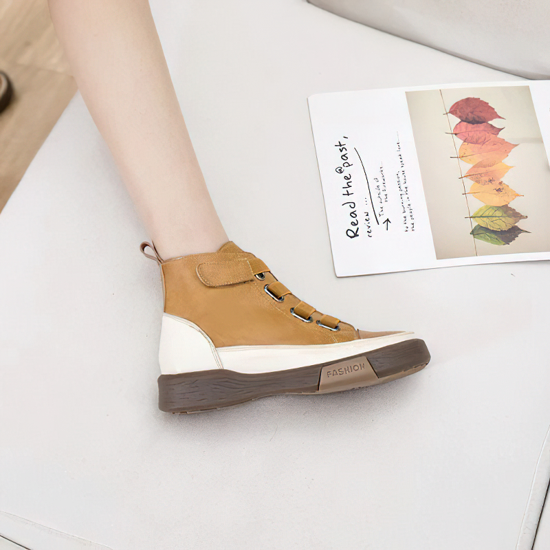 Stylish women's genuine leather sneakers in brown and white, featuring a round toe and easy velcro straps.