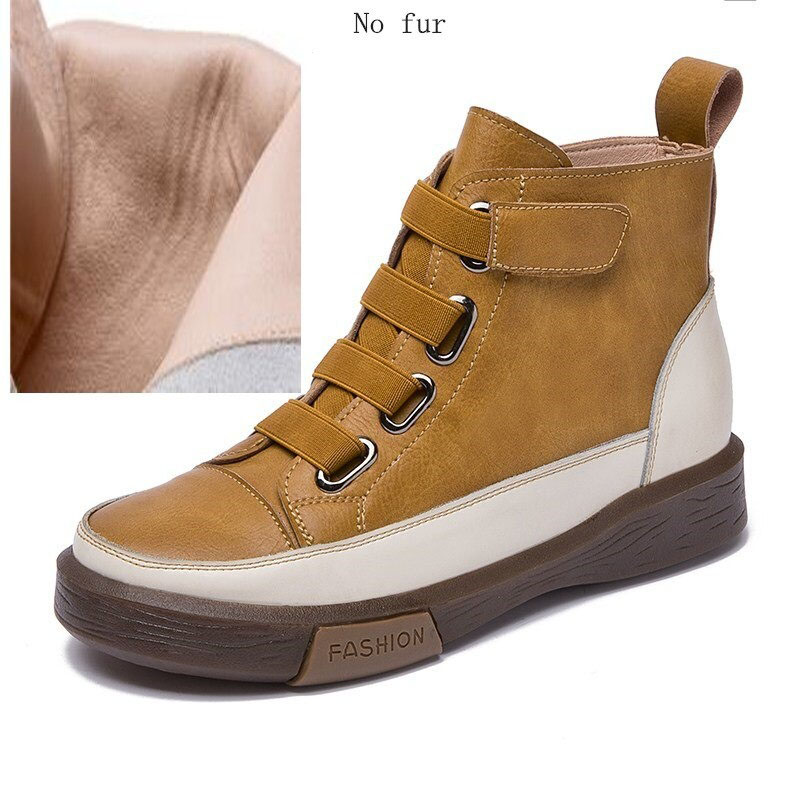 Stylish women's genuine leather sneakers with round toe design and velcro straps, available in trendy colors.