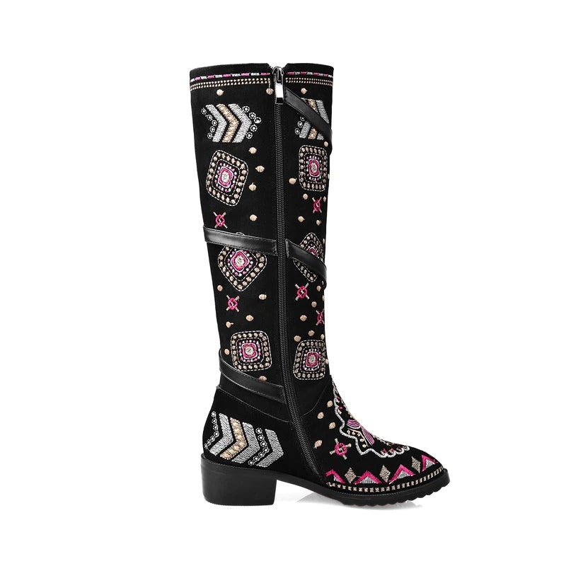 Stylish women's genuine leather western boots with elegant embroidery and trendy designs, perfect for edgy outfits.