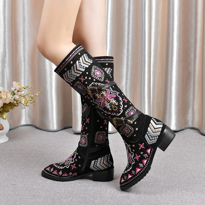 Women's genuine leather western boots with vibrant embroidery, perfect for trendy outfits and summer festivals.