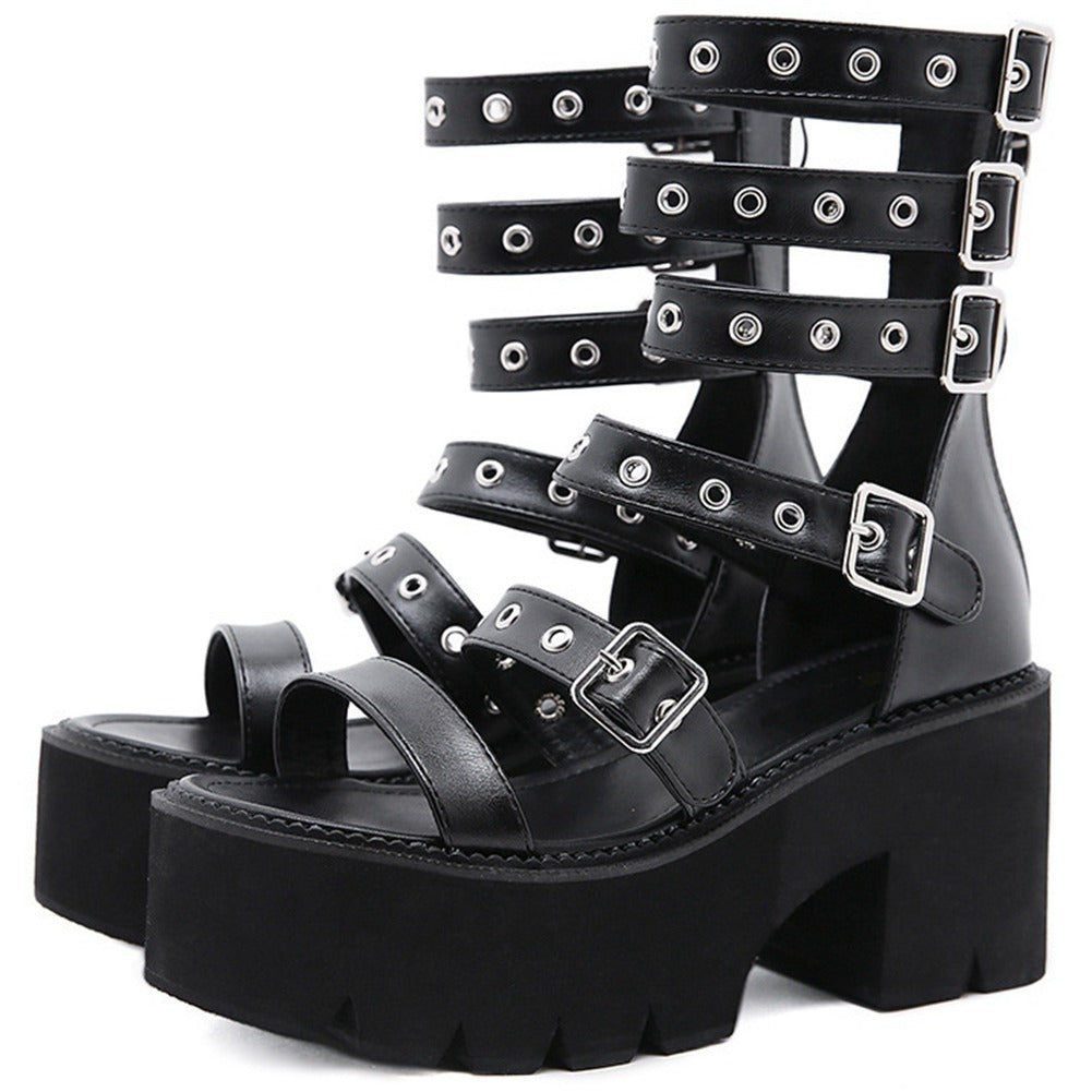 Women's black gladiator platform sandals with zippers, buckles, and rivets, perfect for summer fashion.