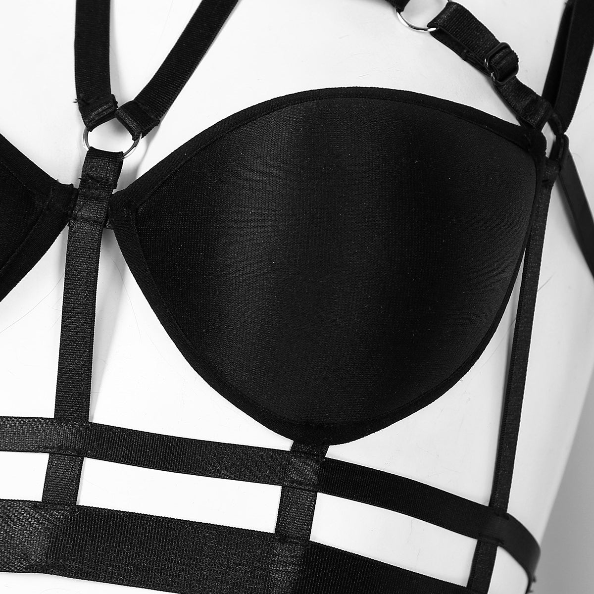Close-up of a black women's gothic pentagram bra top featuring elegant strappy design and wire-free support.