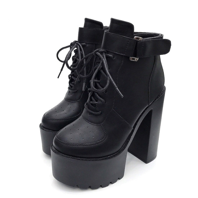 Stylish women's black lace-up high-heeled ankle boots with a platform for alternative fashion outfits.