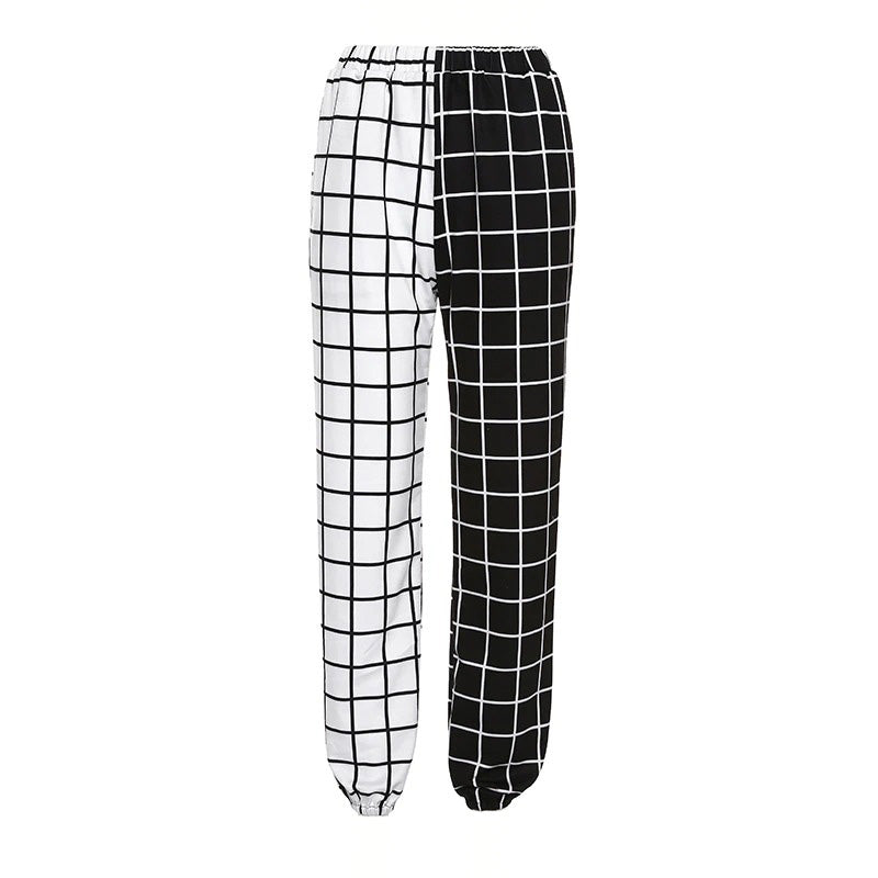 Stylish women's gothic cargo pants with black-white checkerboard print, featuring a high waist and comfortable fit.