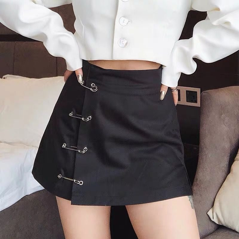 Stylish low waist A-line black skirt with clips, perfect for a gothic look and showcasing your unique style.