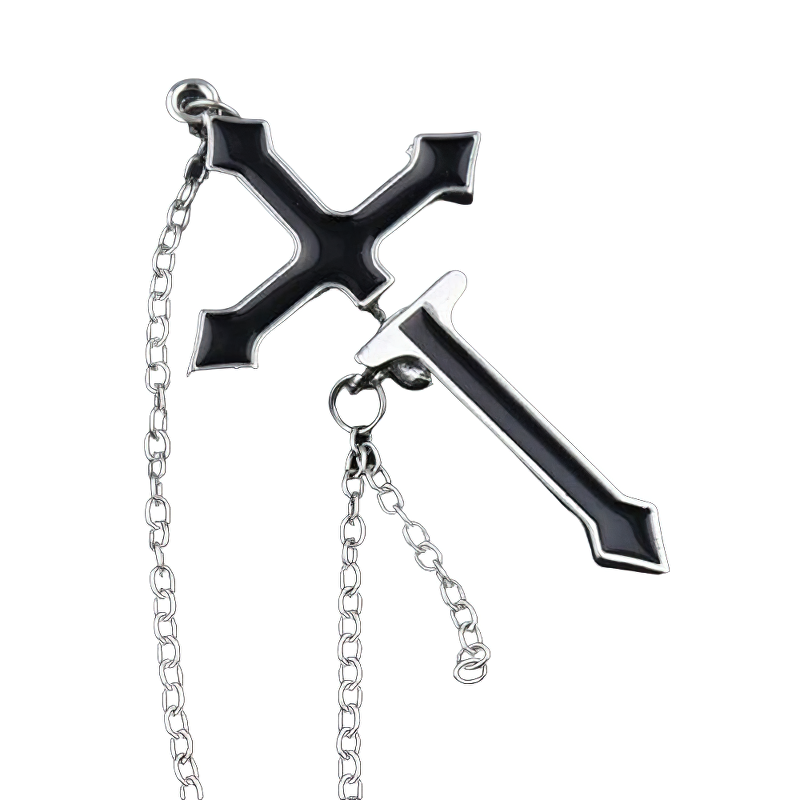 Stylish black cross earring on a silver chain, perfect gothic accessory for any outfit.