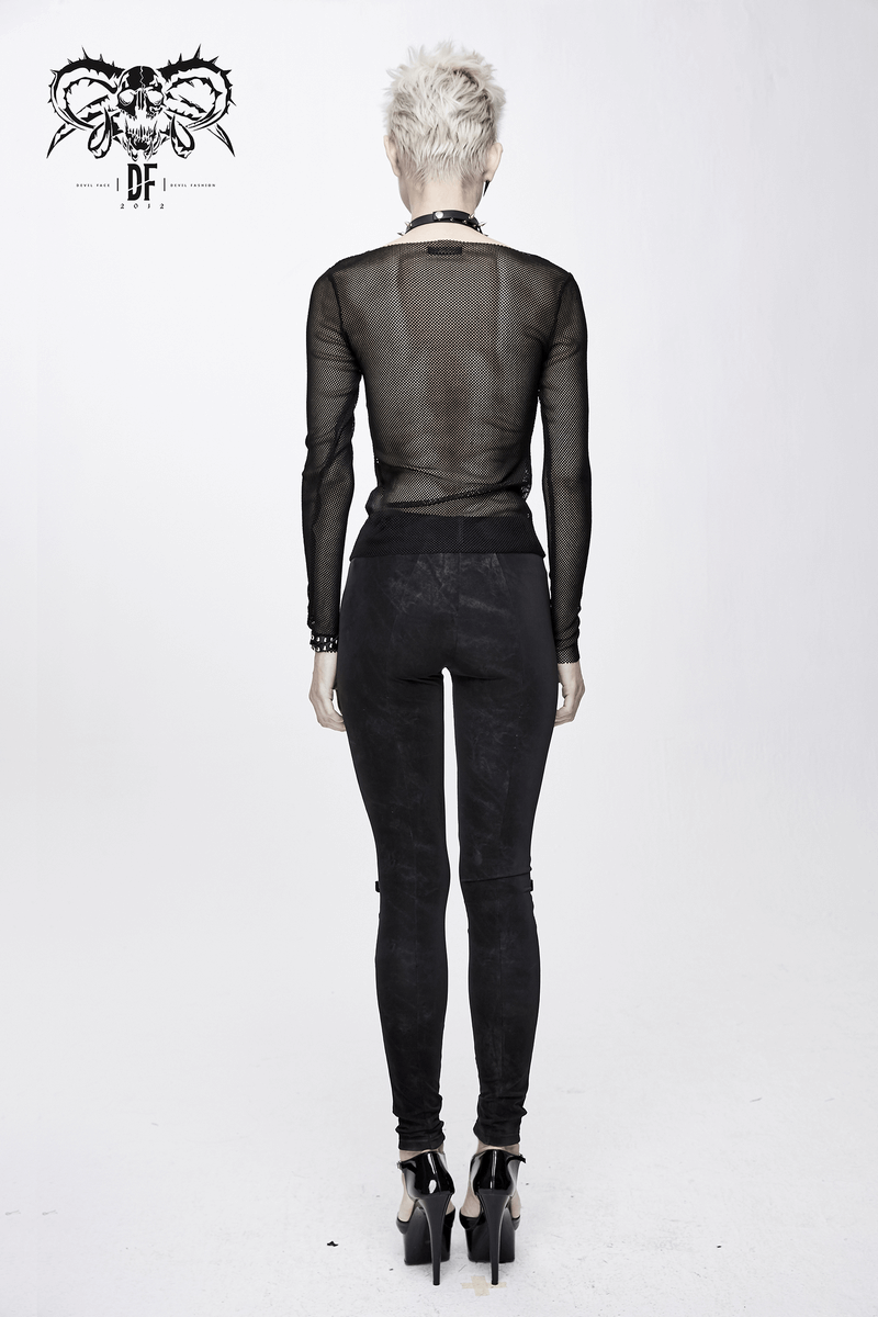 Back view of a model wearing a women's gothic black mesh long sleeve top paired with stylish black skinny jeans.