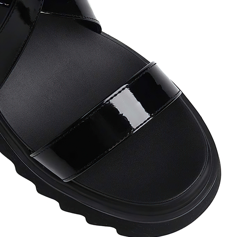 Close-up of women's gothic PU leather high sandals in sleek black, showcasing stylish straps and modern design for alternative fashion.