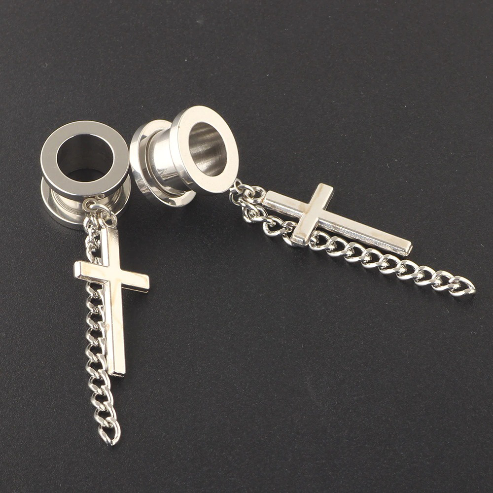 Women's gothic stainless steel ear tunnels featuring cross charms and chains for a trendy look.