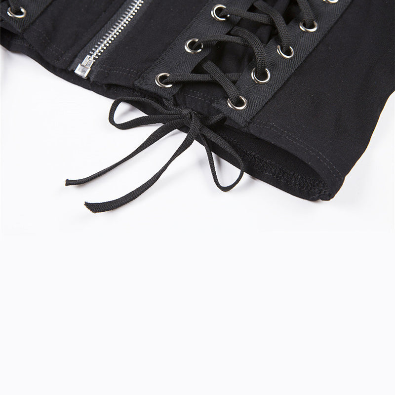 Close-up of women's gothic sleeveless top featuring lace-up front and zipper detail, perfect for edgy outfits.