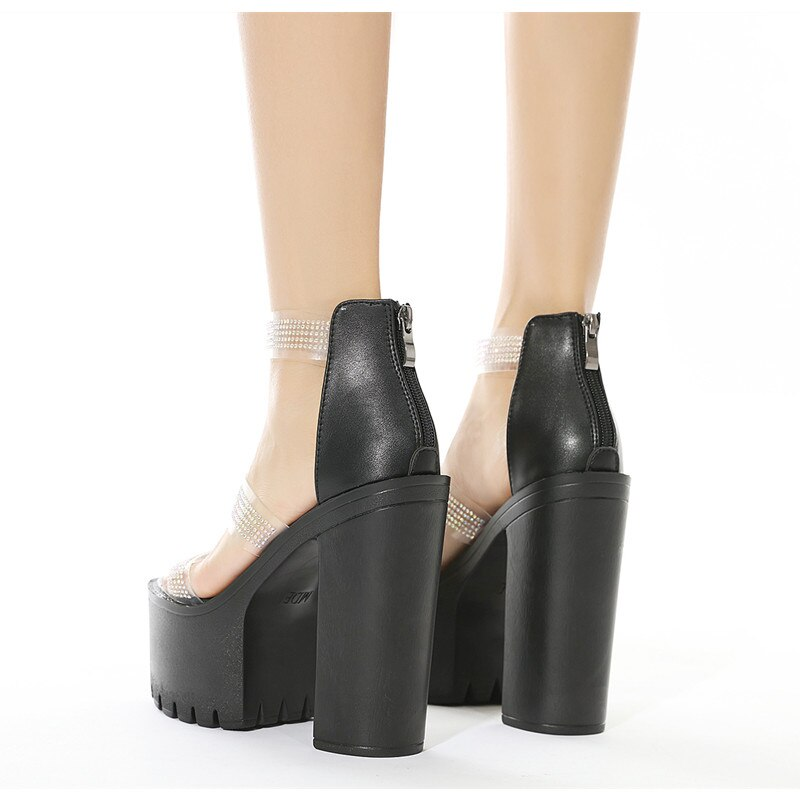 Stylish women's heeled sandals with rhinestones, featuring a sleek black design and tall block heels.