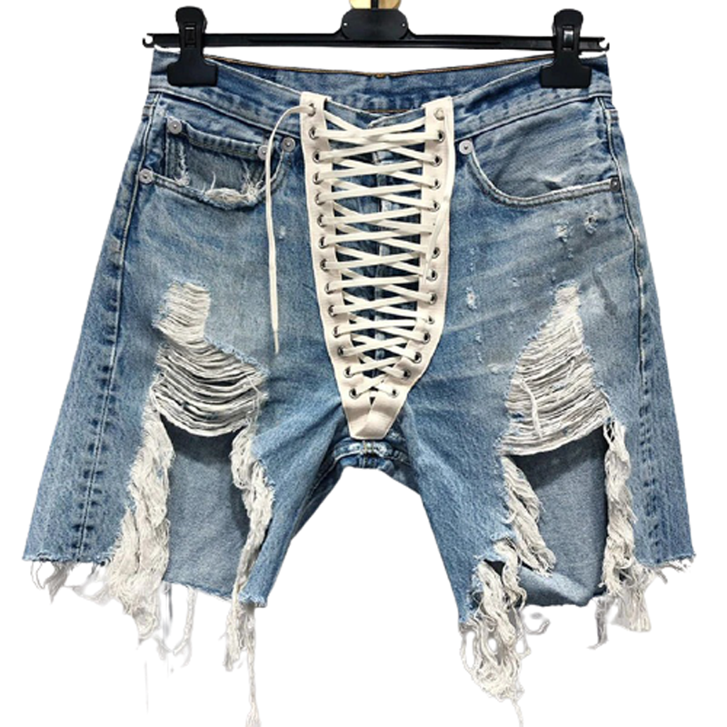 Light blue high waist denim shorts with lace-up front, ripped details, and pockets, perfect for fun summer outings.