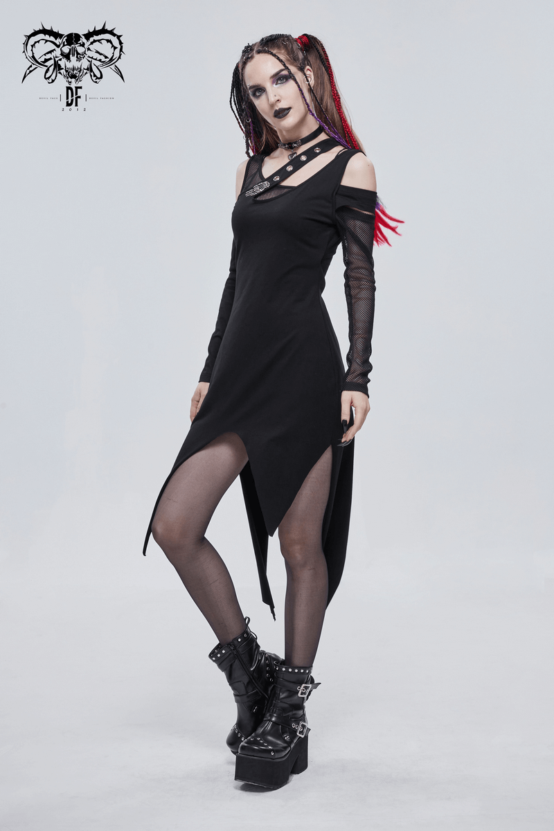 Stylish woman in a black gothic irregular cutout dress with long sleeves and edgy accessories.