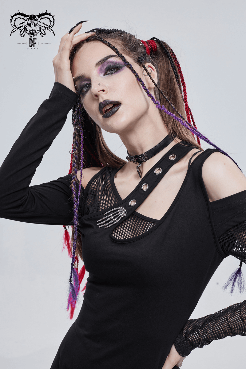 Woman in a black gothic dress with mesh accents and colorful braided hair, showcasing edgy style and bold fashion.