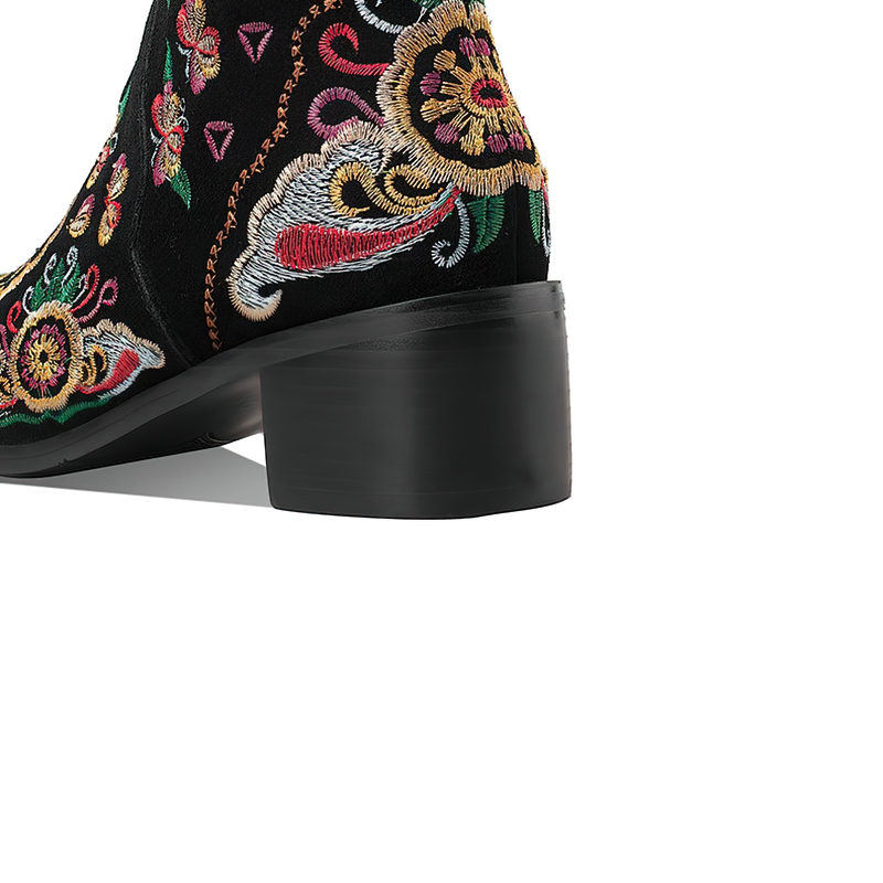 Women's knee-high boots with vibrant embroidery and thick heels, featuring a stylish design in black suede.