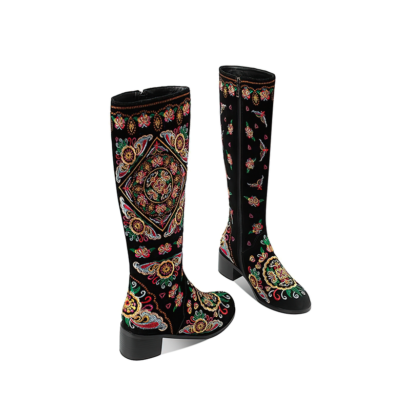 Women's knee high boots with colorful embroidery, genuine leather, and thick heels, perfect for an ethnic style look.