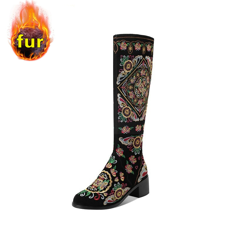 Women's knee high boots in black suede with vibrant embroidery and thick heels, featuring a cozy fur lining.