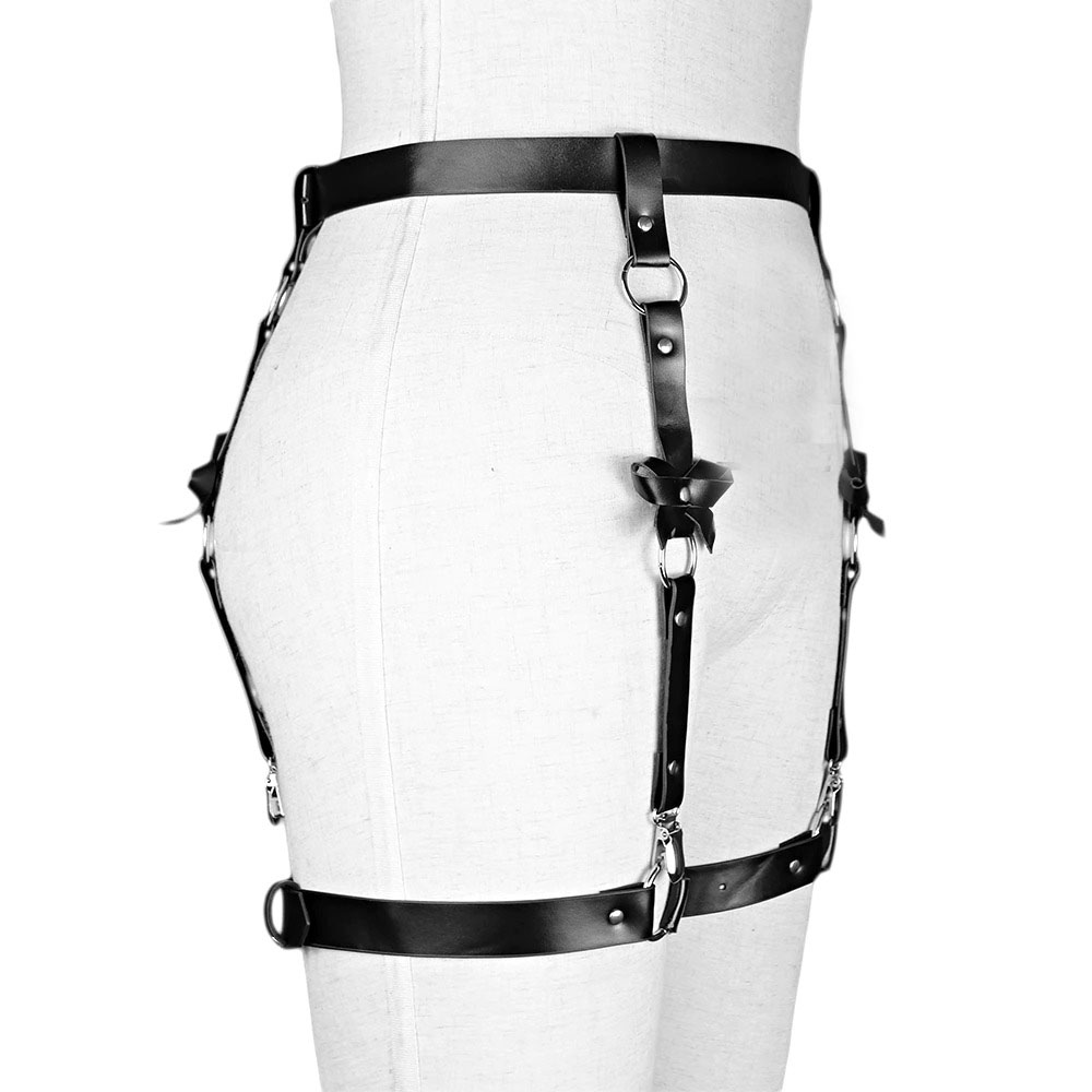 Women's gothic leather body harness with adjustable straps and silver details for an edgy BDSM look.