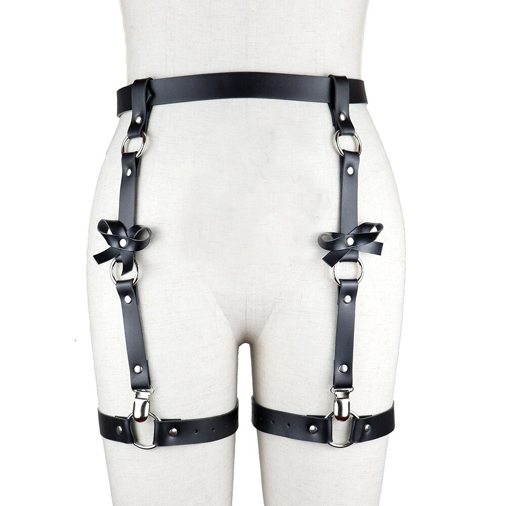 Black leather BDSM body harness with silver accents and bows, perfect for gothic style and intimate experiences.