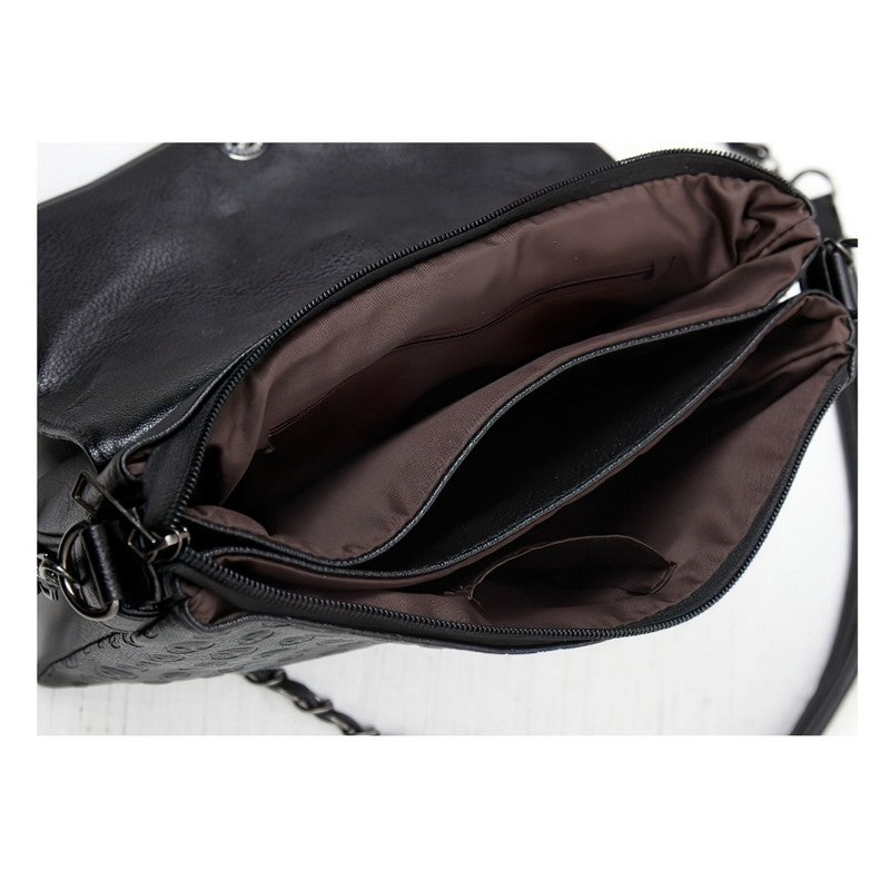 Inside view of Women's Leather Gothic Handbag showcasing spacious compartments and brown lining.