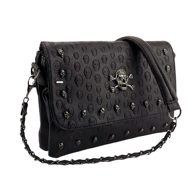 Trendy women's leather gothic handbag with skull design and shoulder strap, perfect for vintage dark style.