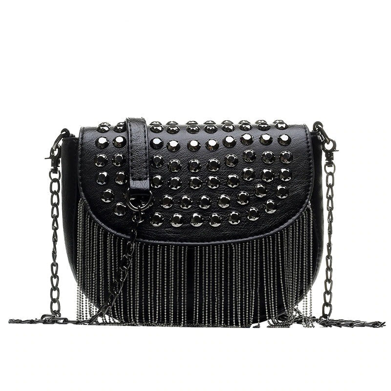 Stylish women's leather shoulder bag with rivets and fringe, perfect for casual outings and evening wear.