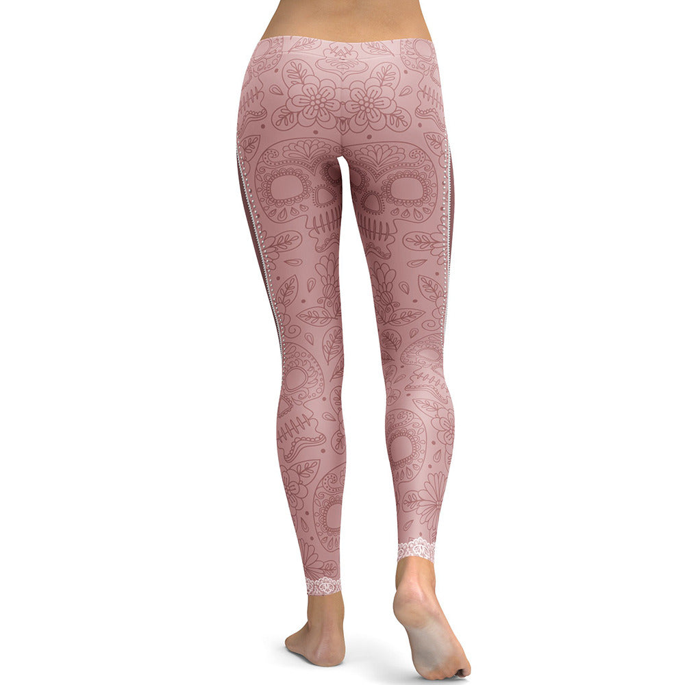 Back view of women's pink skull print leggings, perfect for workouts or adding a rock style to any outfit.