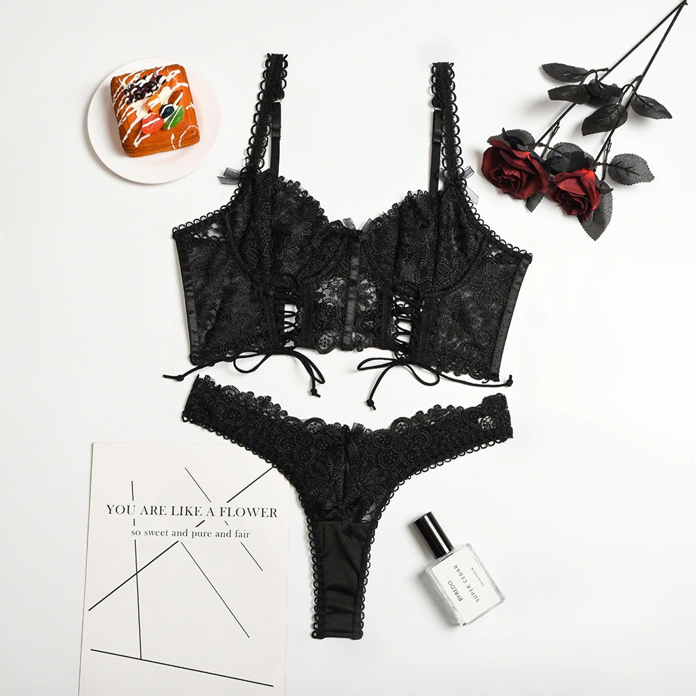 Gothic style women's lace lingerie set featuring a black bra and matching panties, perfect for a sexy look.
