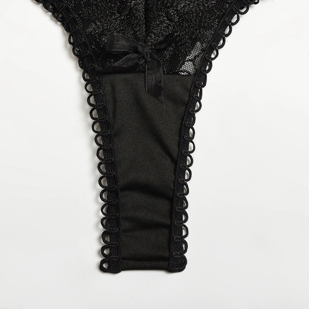 Gothic women's lace thong with bow detail, featuring intricate lace trim and a sleek black design.
