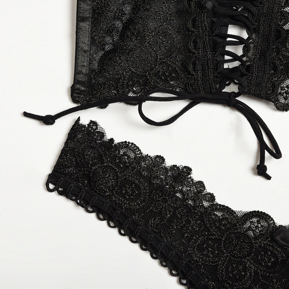 Black lace lingerie set featuring a sexy lace-up bra and matching panties in Gothic style.