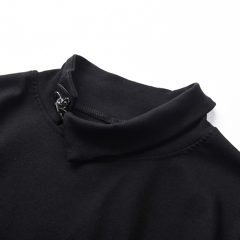 Close-up of black stand collar on women's long sleeve asymmetrical top, showcasing stylish design details.