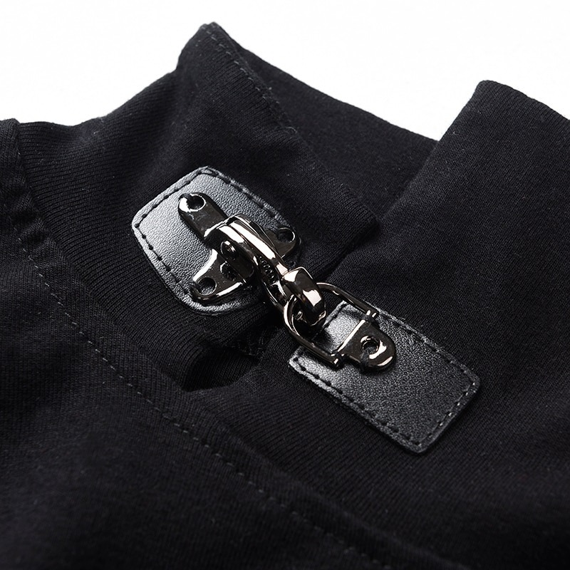 Close-up of the stand collar detail and metal clasp on a women's black asymmetrical top.