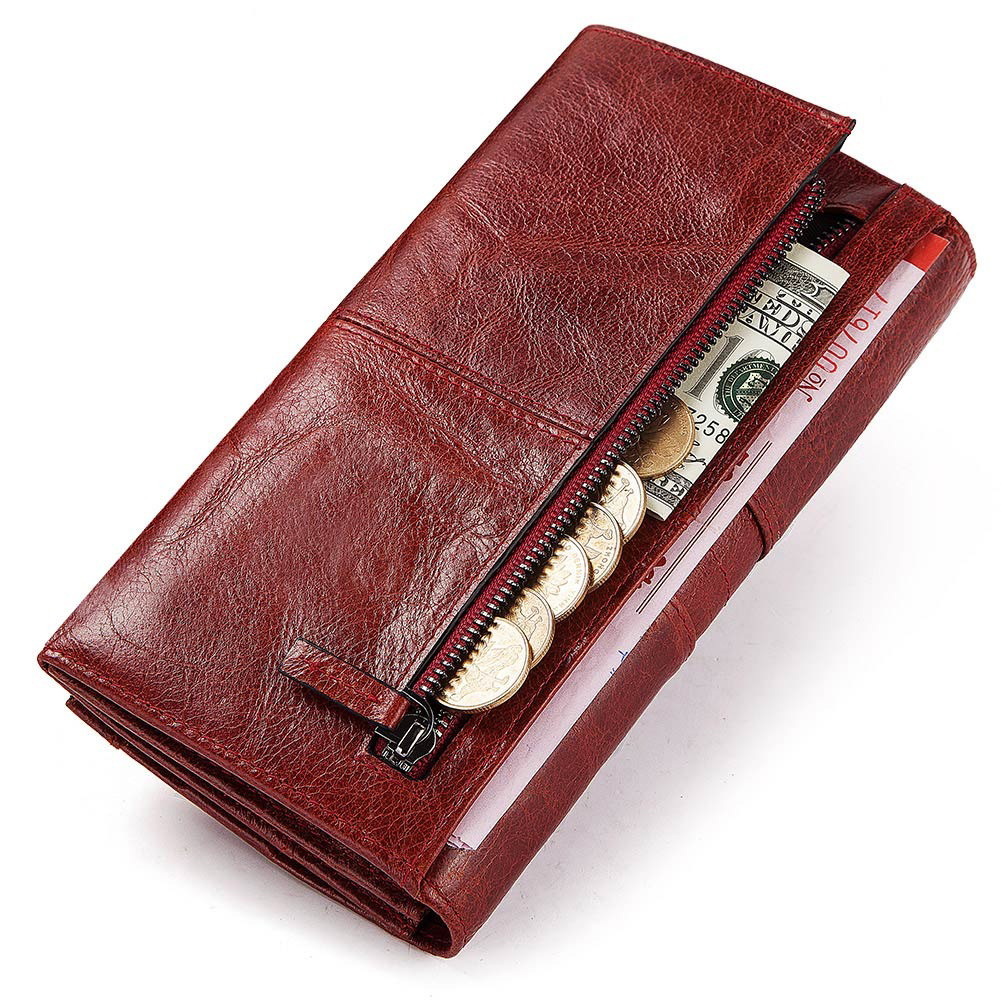 Red genuine leather women's long wallet-clutch with coins, bills, and card slots, perfect for trendy fashion lovers.