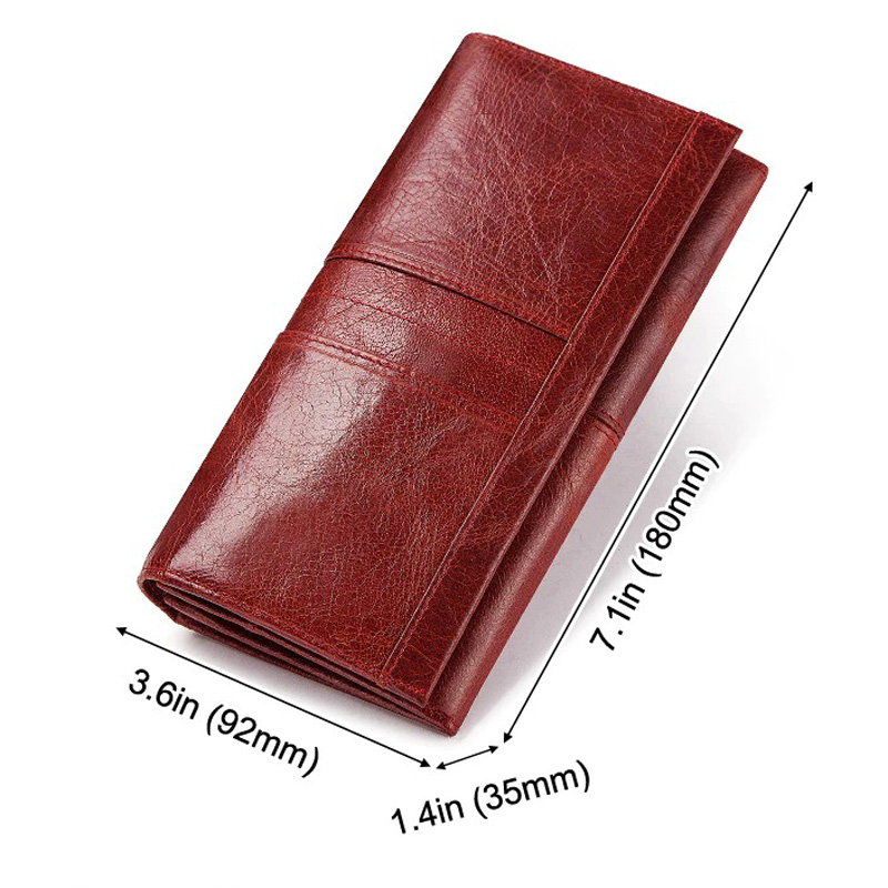 Red genuine leather women's long wallet-clutch with dimensions 7.1in x 3.6in x 1.4in, stylish and functional design.