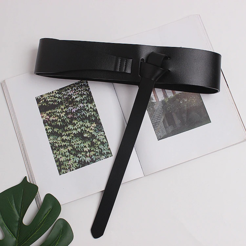 Women's luxury wide PU leather belt designed to elevate any outfit, perfect for accentuating your waist.