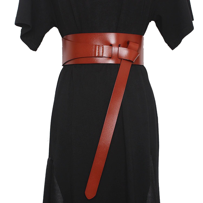 Stylish women's luxury designer belt in soft wide PU leather, perfect for complementing dresses and accentuating waistlines.