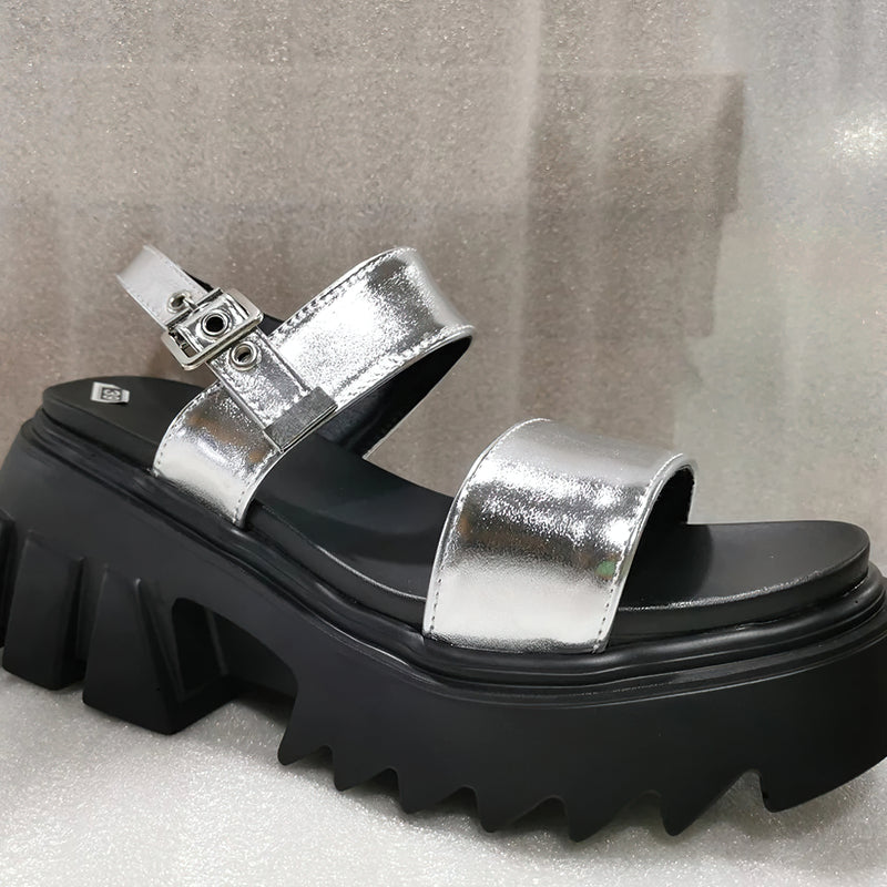 Silver women's chunky platform sandals with buckle strap, perfect for summer fashion and casual outings.