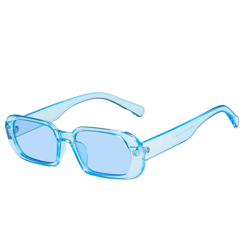 Blue tinted women's luxury small oval sunglasses, stylish and trendy eyewear perfect for casual outfits.
