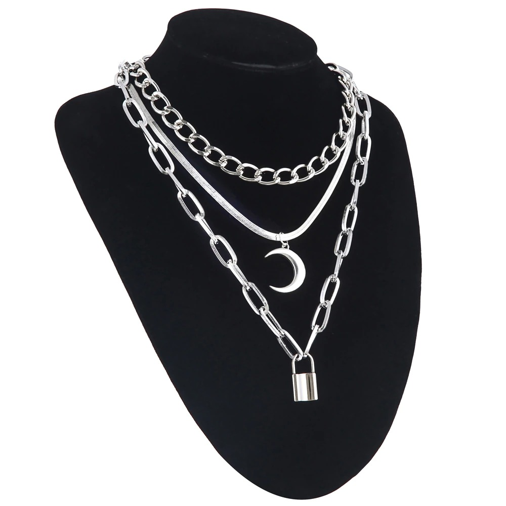 Trendy women's gothic style chain necklace with moon and lock pendants, perfect for stylish outfits.