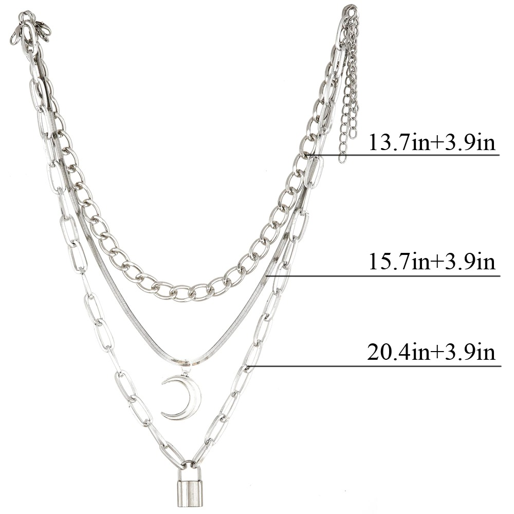 Layered silver chain necklace featuring moon and lock pendants, with adjustable lengths for a trendy gothic look.