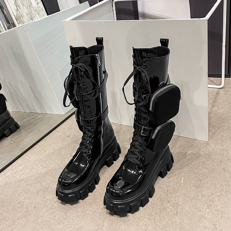 Women's black platform motorcycle boots with functional pockets, mid-calf genuine leather stylish design.