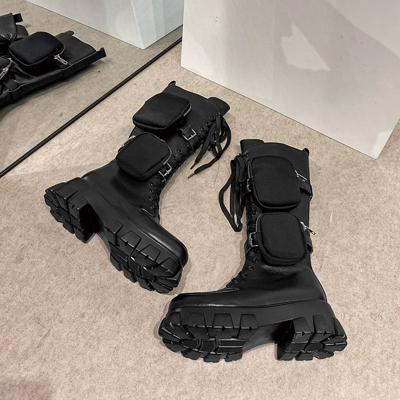 Women's mid-calf black platform boots with pockets, made of genuine leather, perfect for alternative fashion.