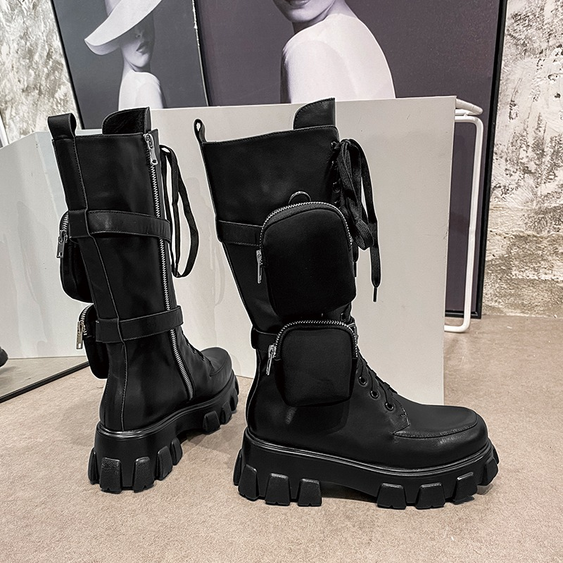 Sleek black mid-calf platform boots with pockets, made of genuine leather for alternative fashion.