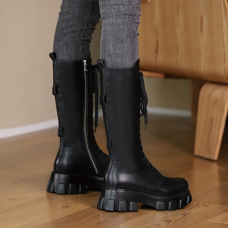 Women's black platform motorcycle boots with pockets, mid-calf genuine leather, stylish and alternative fashion.