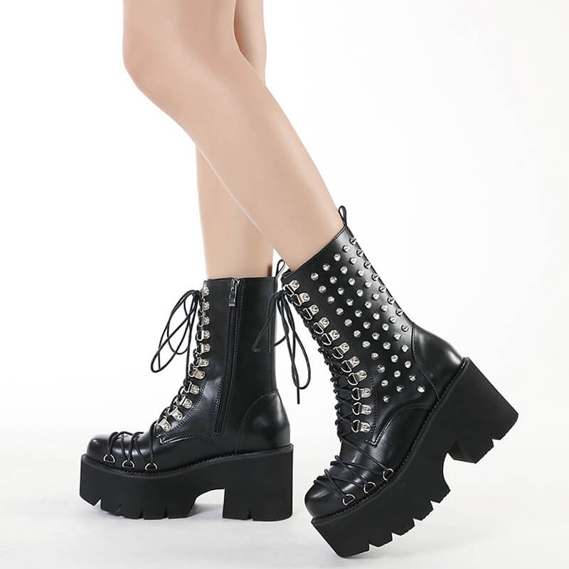Women's punk-style motorcycle platform boots with rivets and chunky heels for a bold look.