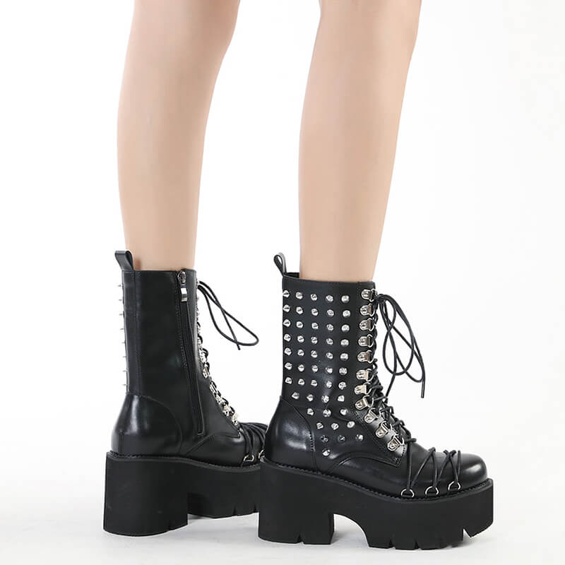 Stylish women's punk motorcycle platform boots with rivets and lace-up design, perfect for a bold, trendy look.