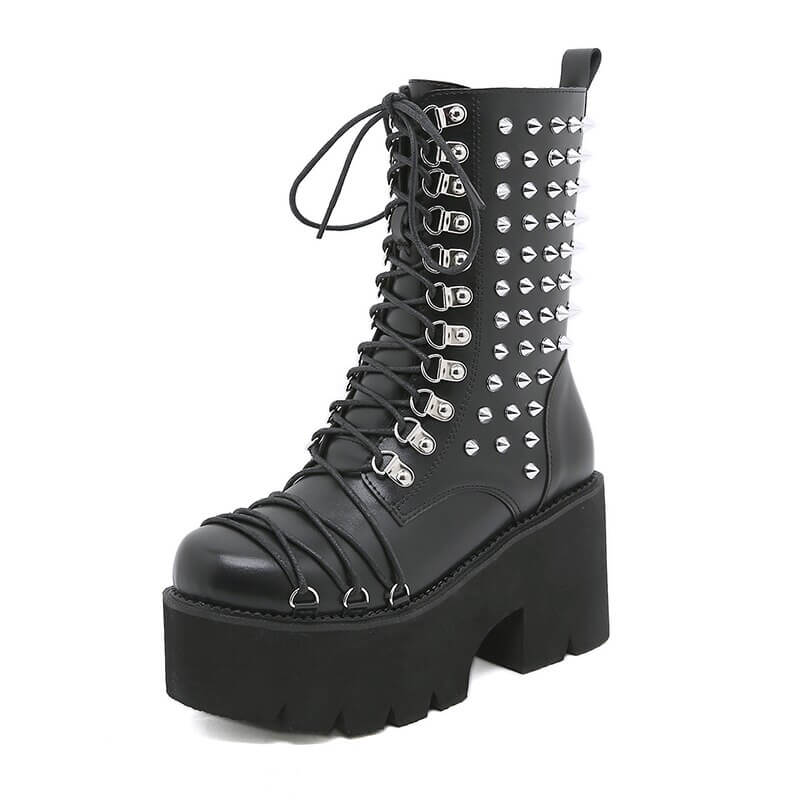 Black punk style motorcycle boots with rivets and chunky platform heels for a bold fashion statement.
