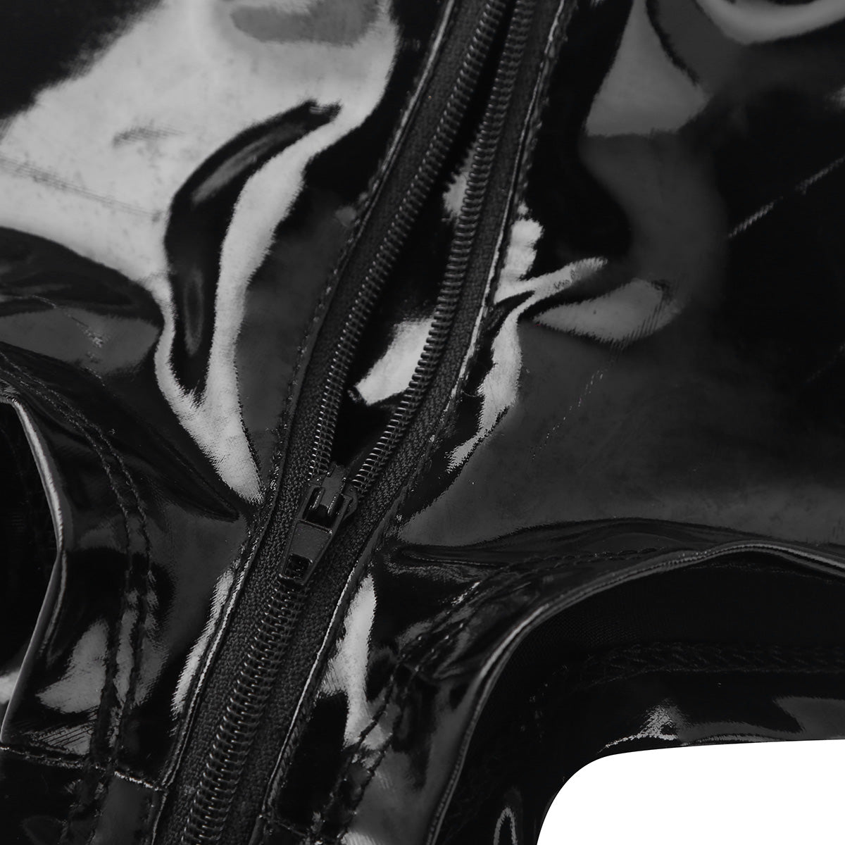 Close-up of glossy black faux leather zipper detail on women's bodysuit lingerie, showcasing stylish design.