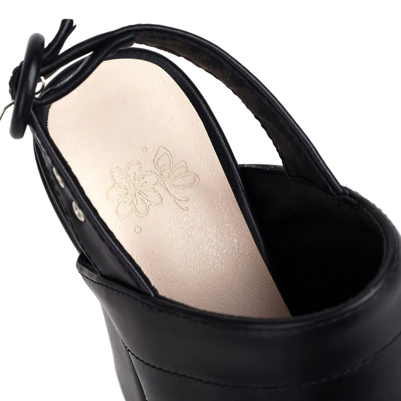 Close-up of Women's Open Toe Platform Sandals showcasing black PU leather and unique flower embossed insole.